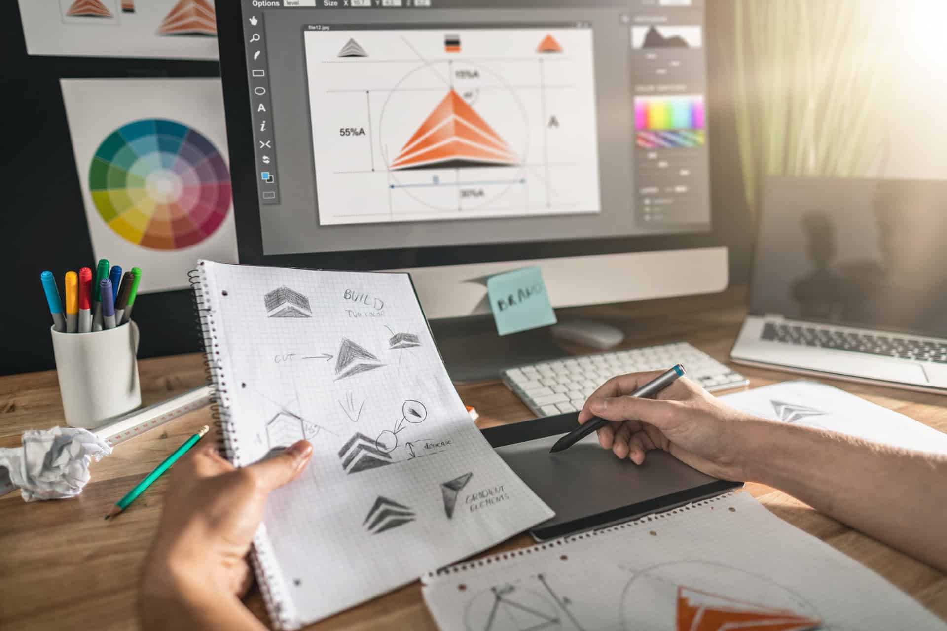 Graphic Designer Drawing Sketches Logo Design.